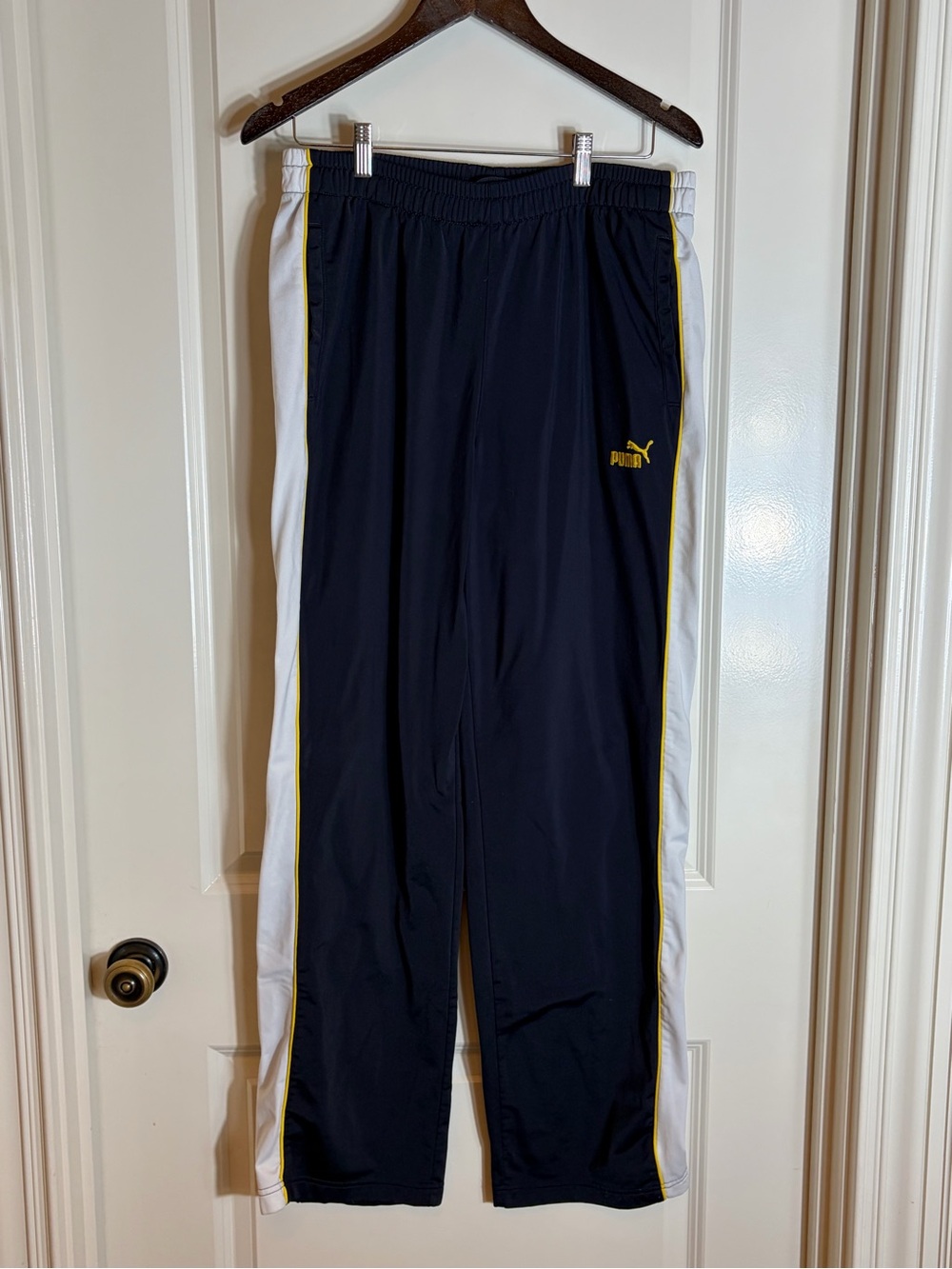 Puma Men’s Navy Joggers with White Side Panels and Yellow Piping